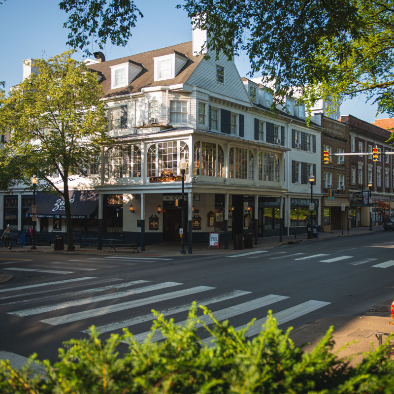 A photo of downtown State College at the Corner of Allen Street and College Avenue