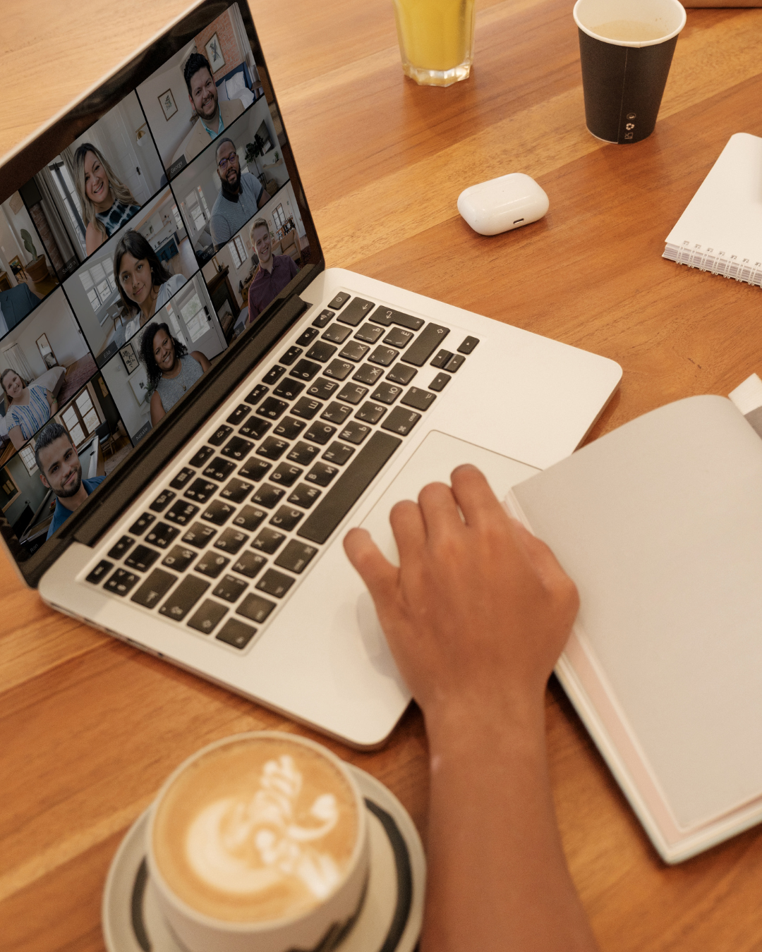 Photo of a virtual (Zoom) webinar and a latte